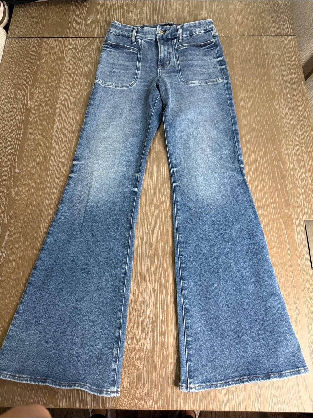 Like new express 70s flare midrise Jeans in Medium Blue